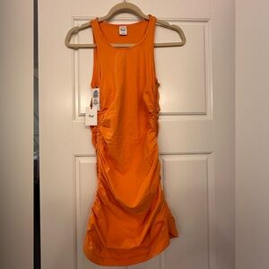 Orange Aritzia TNA dress. Size small. Never worn. New with tags.
